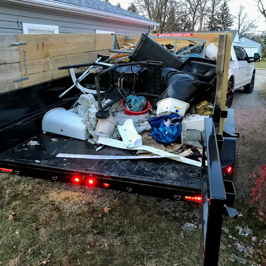 Roll-off dumpster delivered to a residential driveway in Carthage